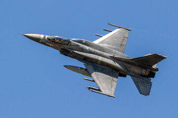 Air force fighter jet plane in full flight. - Powered by Adobe