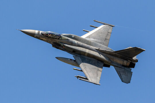 Air force fighter jet plane in full flight.