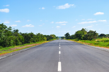 An empty highway against sky in rural Malawi