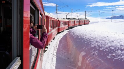 Europe, Switzerland Alps , Poschiavo February 2021 - Live shot from the window  of the  Bernina...