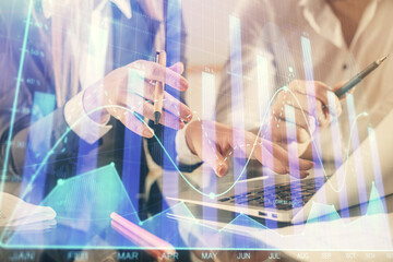 Double exposure of man and woman working together and forex chart hologram. Business concept. Computer background.