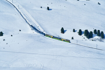 Train of Wengenalpbahn on the way to station Eiger Glacier. Photo taken February 26th, 2021, Grindelwald, Switzerland.