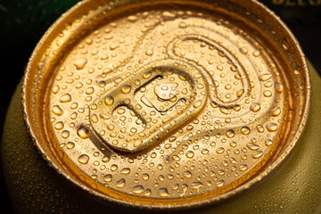 Cold metal beer can with water drops. Alcoholic drink. Canned drinks.