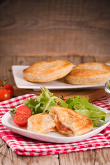 Puff pastry filled with tomato and mozzarella cheese.