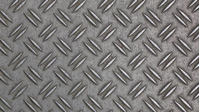 Anti slip gray metal plate with diamond pattern