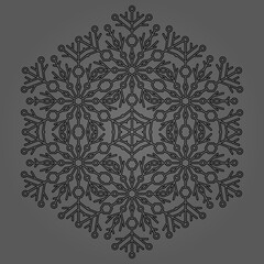 Round snowflake. Abstract winter ornament. Black snowflake