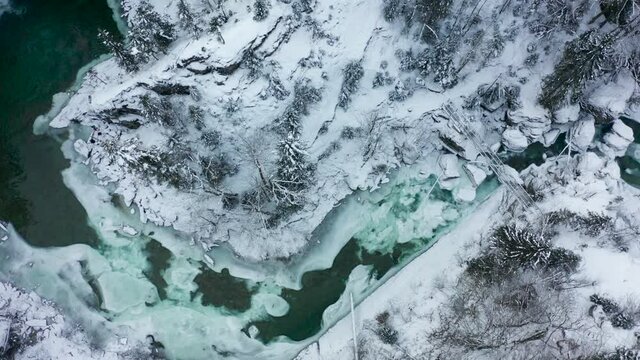 Aerial snow covered river ice gren