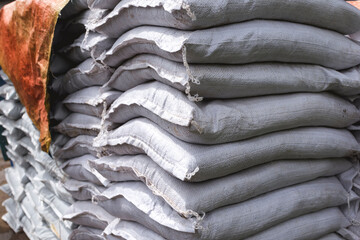 Sacks of organic fertilizer for sale at a plant store or stored at a warehouse.