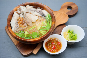 Boiled rice soup with sea bass