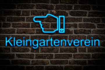 Fototapeta premium Leuchtreklame Kleingartenverein