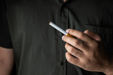 A young man with a cigarette He is going to smoke