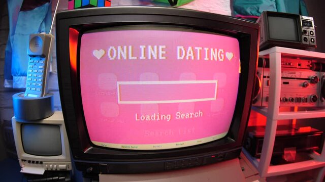 Retro online dating concept on a vintage computer screen showing match-making results. 80s 90s concept.