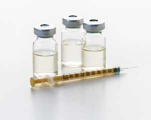 syringe and medicine bottle
