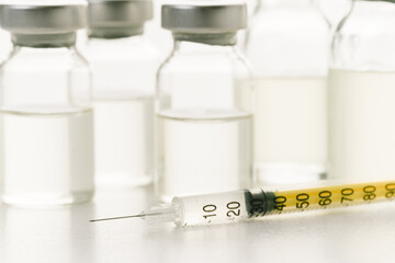 syringe and medicine bottle