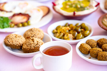 Arabic breakfast table full of tasty dishes