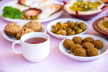 Arabic breakfast table full of tasty dishes