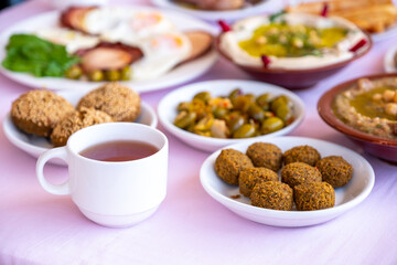 Arabic breakfast table full of tasty dishes