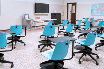 social distancing between school desks in an empty classroom