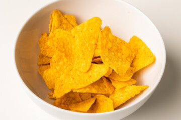 Crispy mexican nachos chips salty.Snacks Fast food or junk food snacks unhealthy concept.