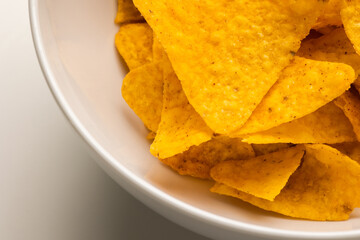 Crispy mexican nachos chips salty.Snacks Fast food or junk food snacks unhealthy concept.