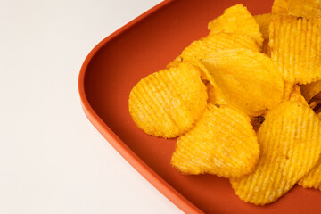 Crispy potato chips. Snacks Fast food or junk food snacks unhealthy concept.