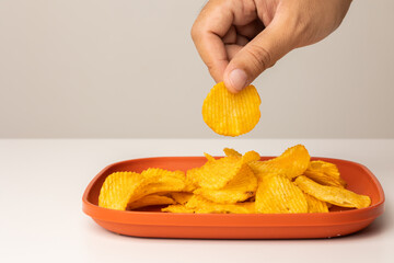 Crispy potato chips. Snacks Fast food or junk food snacks unhealthy concept.