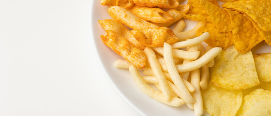 Many Crispy Snacks food potato chip salty. Fast food or junk food snacks unhealthy concept.