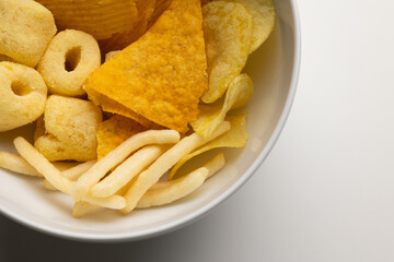 Many Crispy Snacks food potato chip salty. Fast food or junk food snacks unhealthy concept.