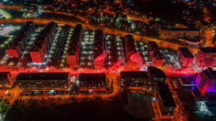 Aerial view of downtown Tuzla at night, Bosnia. City photographed by drone, traffic and objects , landscape