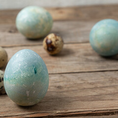 Easter eggs on rustic wooden background. Happy Easter greeting card template
