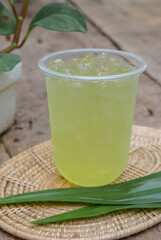Fresh pandan and pandan juice in a glass to drink and enjoy.