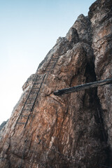 Via ferrata letter on a massive wall at the Toblinger Knoten in the Dolomites, Italy