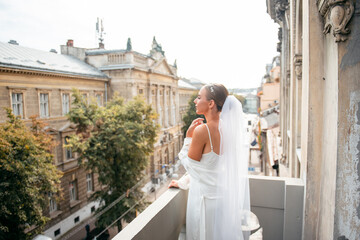 Gorgeous bride in luxury lingerie enjoying morning time