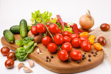 Healthy vegetarian food ingredients on a wooden kitchen board