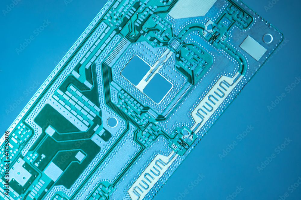 Poster pcb background. tukstura with microcircuit close-up. fragment of pcb with lines and holes on a light