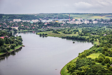 Aerial view of Dniester River between Moldova, Soroca city on left, Tsekynivka village on right