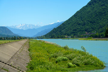 Fototapeta na wymiar The Adda river along the Sentiero della Valtellina at summer