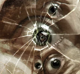 background scared eye in broken glass, horror art © Maxim