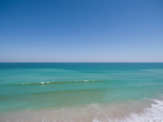 Aqua Atlantic ocean during the late afternoon at Central Florida USA