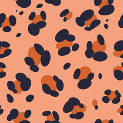 Fototapeta na wymiar Leopard print seamless pattern. Minimalistic hand drawn animalistic trendy pattern. African safari background in natural colors. Vector illustration