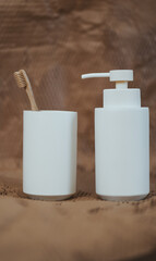 White jars for the bathroom, liquid soap in the boho interior