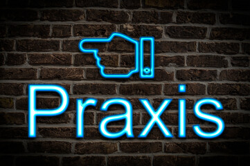 Fototapeta premium Leuchtreklame Praxis