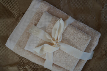 Towels set in boho interior in brown tones