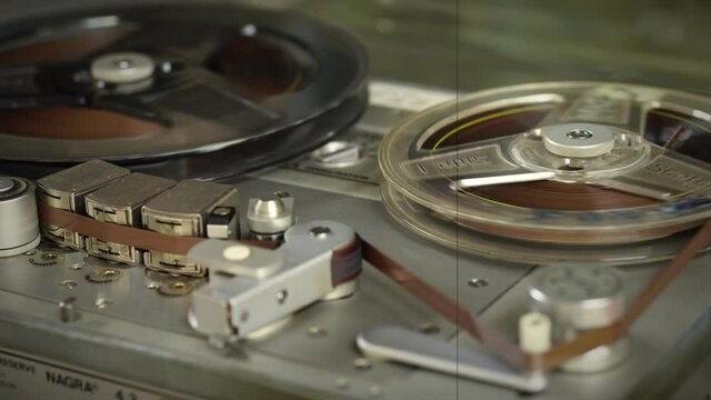 Old vintage reel-to-reel player. Tape recorder with spools. Bobbin tape recorder.