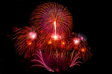 celebration happy new year and merry christmas firework isolated on black isolated background