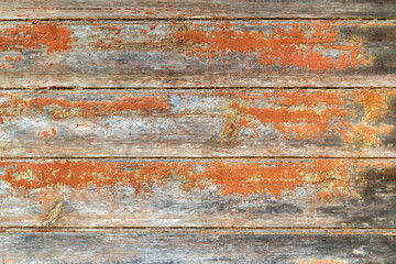 Aged dilapidated wall. Brown or red orange boards