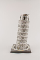 toy leaning tower of pisa on a white background