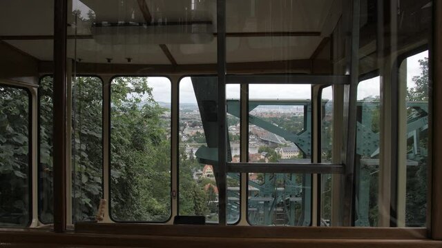 Beautiful top down view from suspension railroad of Dresden cityscape during cloudy day in Germany.