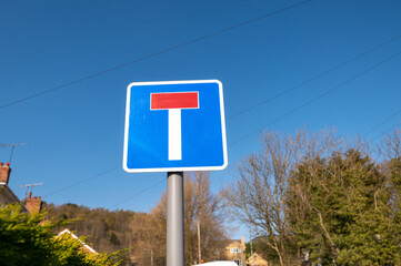 Road sign in the UK advising drivers that the road they are entering is a dead end or no through...