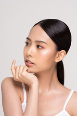 Beautiful Young Asian Woman Looking While Touching Chin feeling so happy and cheerful with healthy Clean and Fresh skin on white ,Plastic Surgery chin,Beauty Cosmetics and spa facial treatment Concept